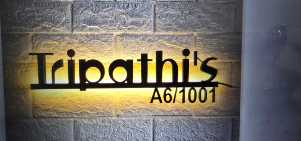 Backlit acrylic name plate with the flat number below it, by ART CENTRRAL, Pune